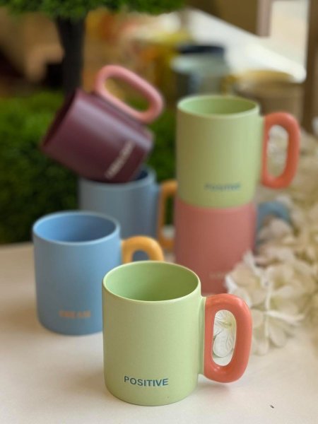 كوب سيراميك مودرن – لون أخضر & برتقالي💚🧡